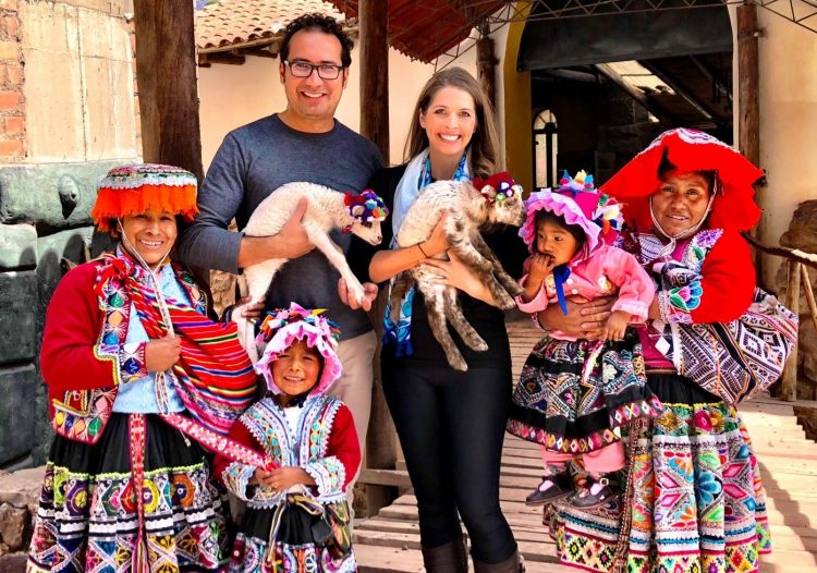 Posing with a Peruvian Family in Pisac Market