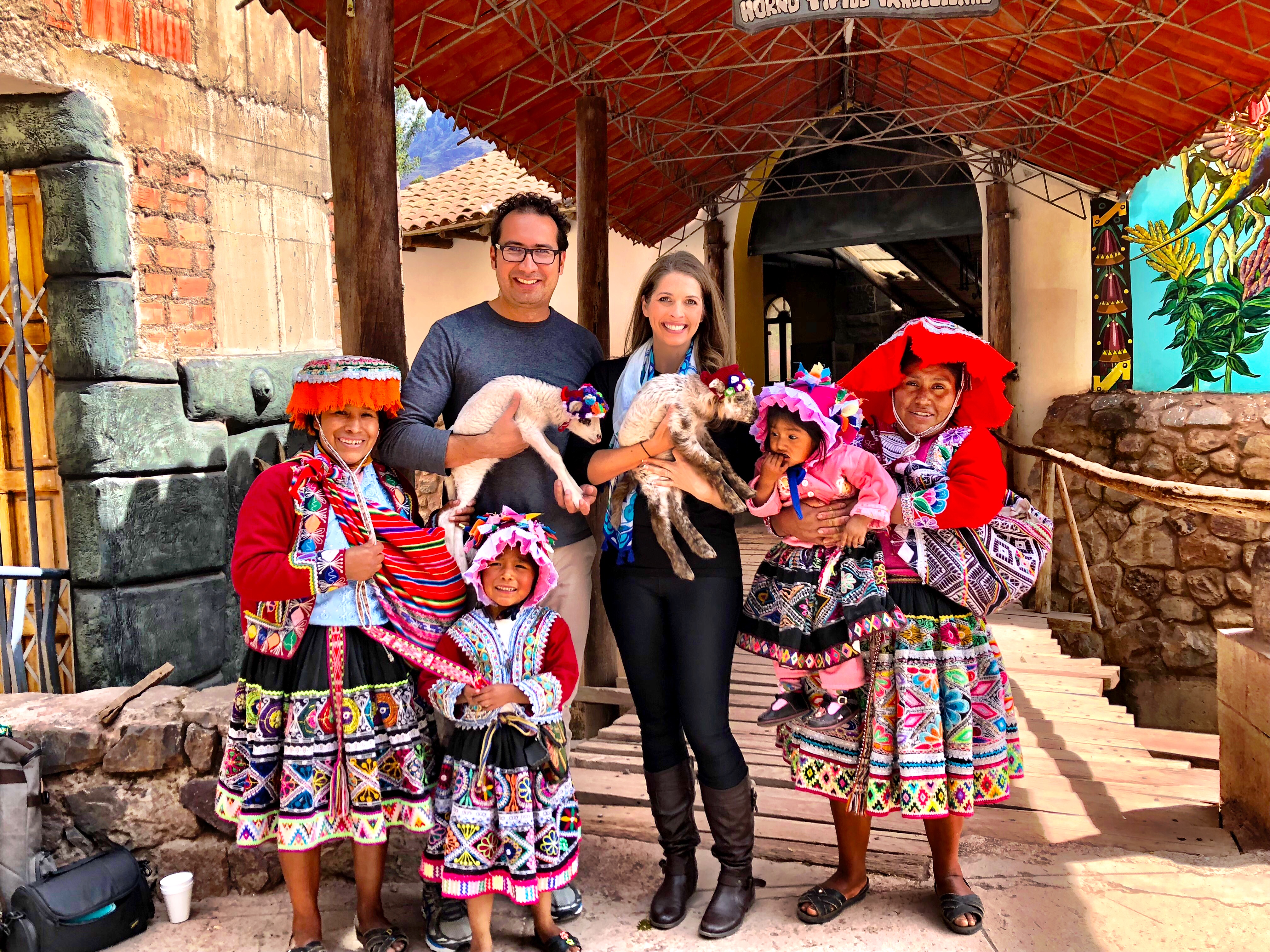 Posing with a Peruvian Family in Pisac Market