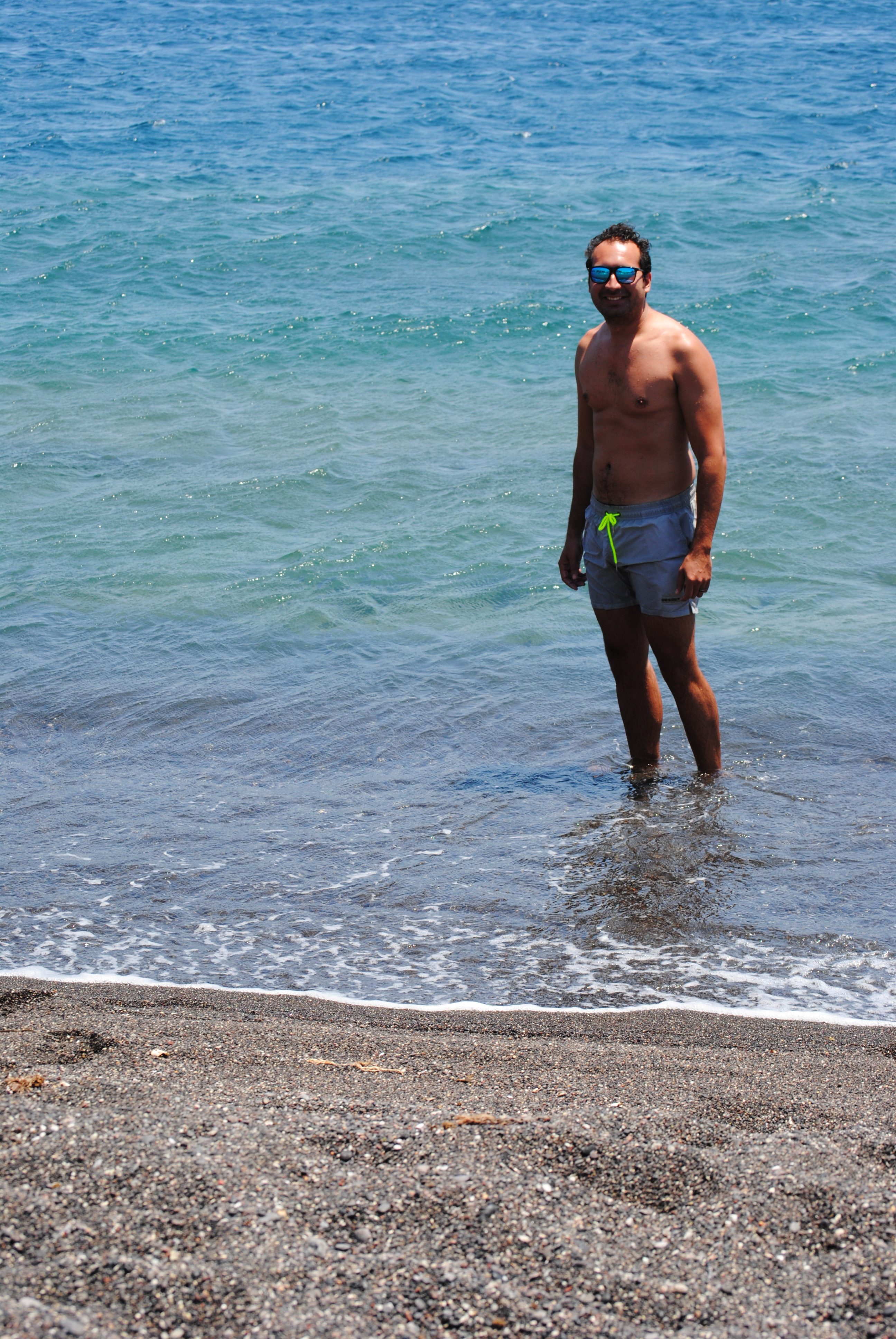 Black sand on Perissa Beach in Santorini