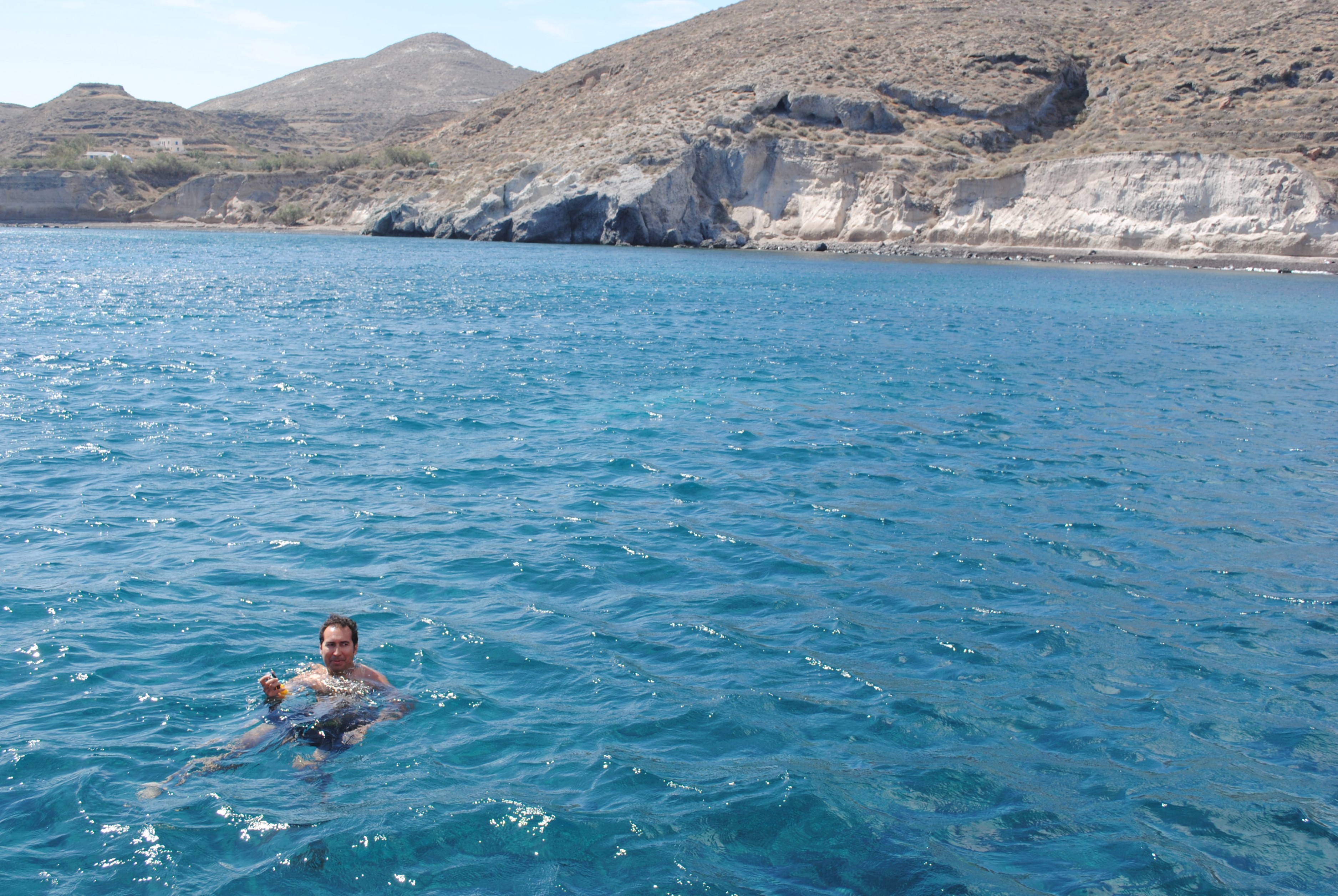 Go swimming in the Caldera in Santorini!