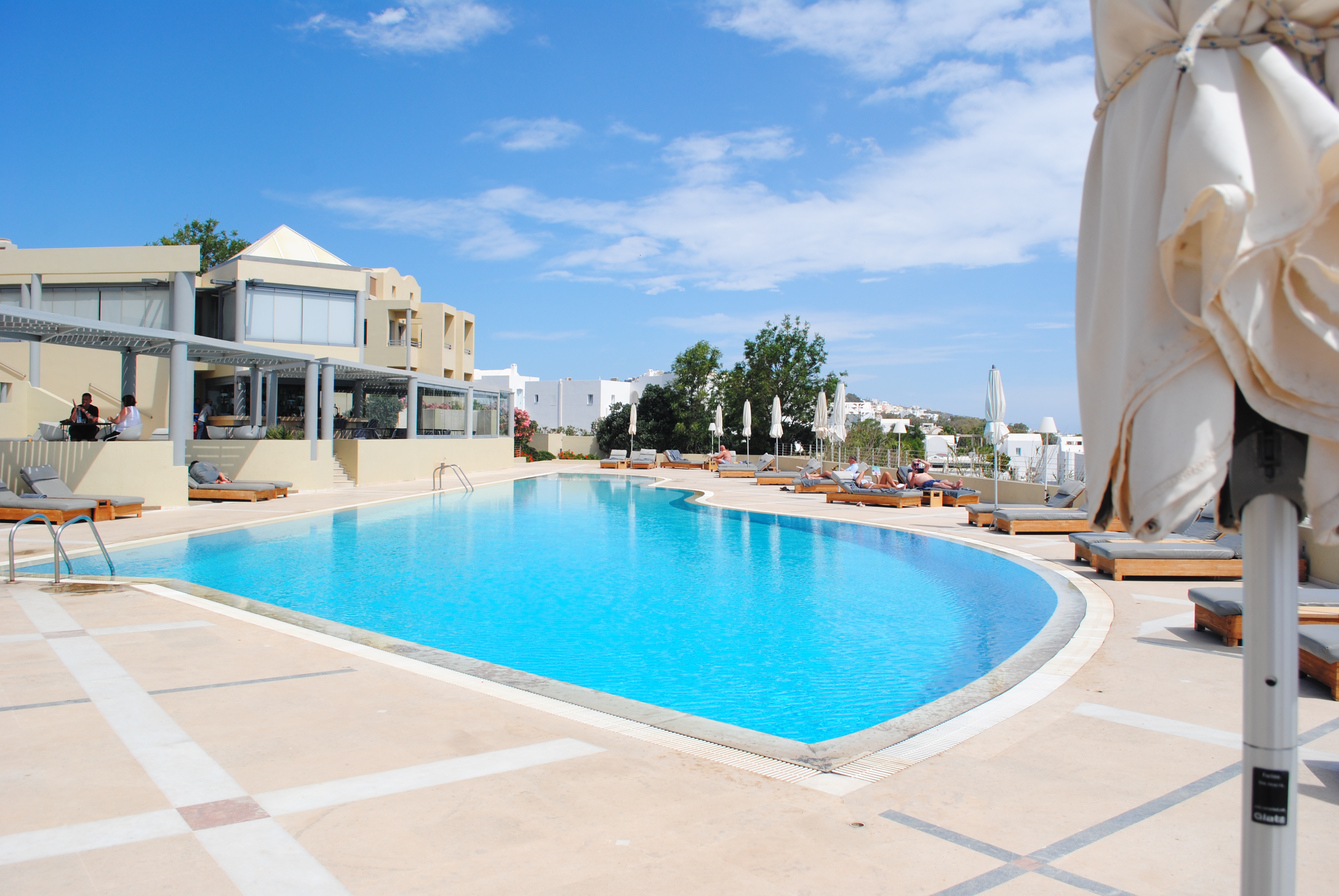 Relax by the pool in Santorini