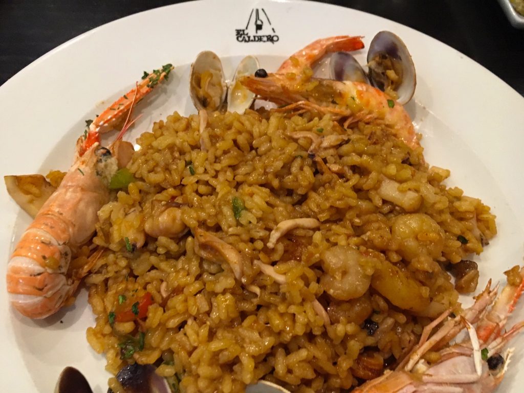 Eat paella in Spain