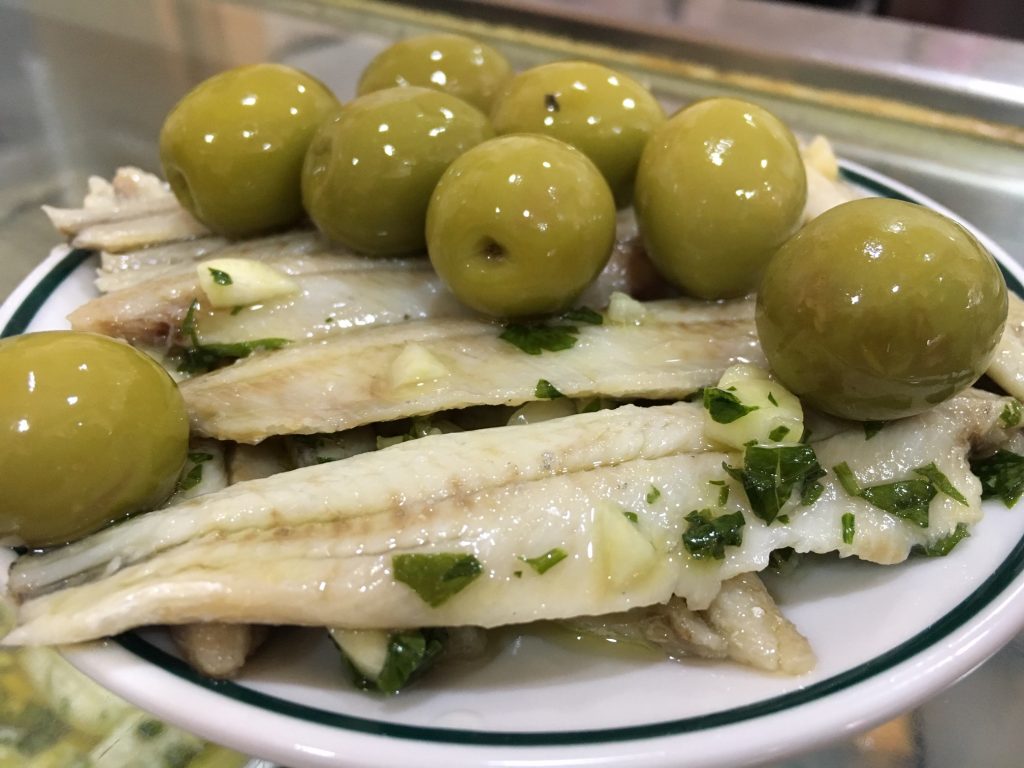 Eat sardines in Madrid at Los Caracoles