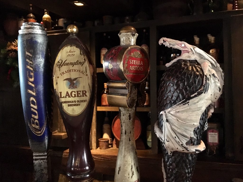 Beer taps at the Hog's Head in Islands of Adventure