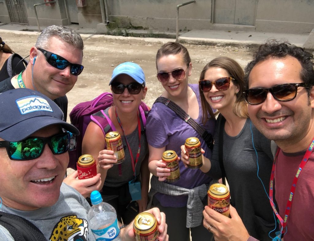 Sipping a beer outside Machu Picchu