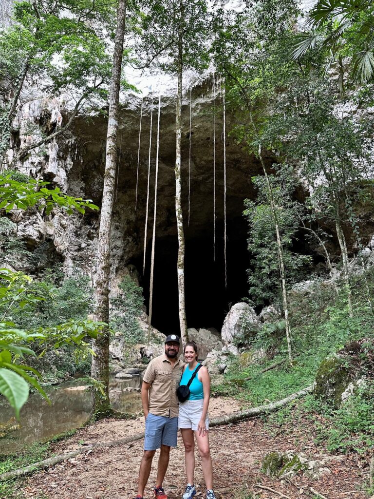 Kristy and WC standing outside Belize's Rio Frio Cave in the Mountain Pine Ridge Forest Reserve
