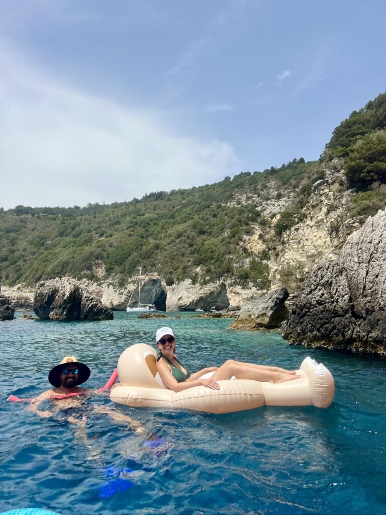 Swimming at Blue Caves, Paxos, Greece